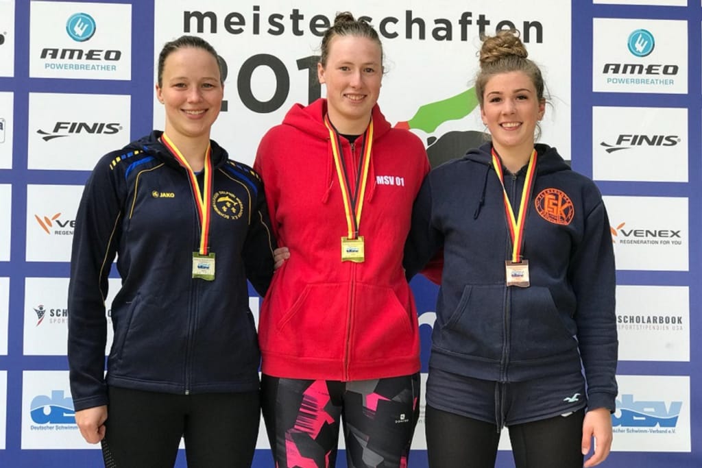 Strahlende Sieger bei den Deutschen Freiwassermeisterschaften 2018 in Mölln.
